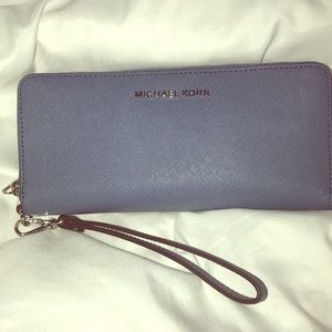 Michael Kors wallet wristlet in blue.